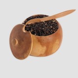 black-tea-leaves-on-wooden-ware-550x688